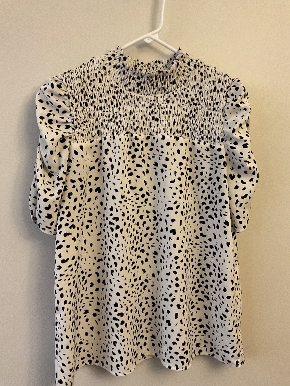 White and black animal print blouse